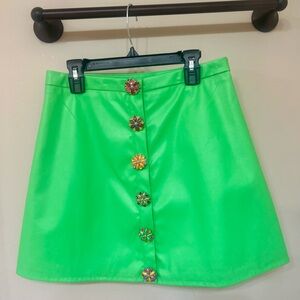 Queen of Sparkles Leather mini skirt with floral buttons